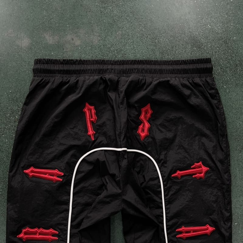 Conjuto Trapstar Irongate 2.0 Shellsuit Rojo Negro