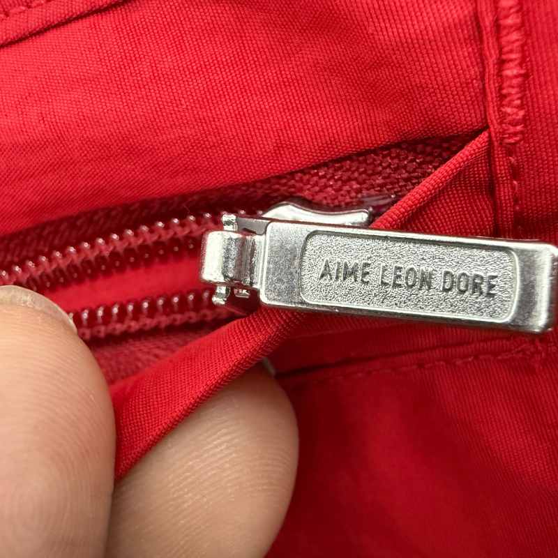 Chamarra Aimé Leon Dore x Porsche Nylon Track Red