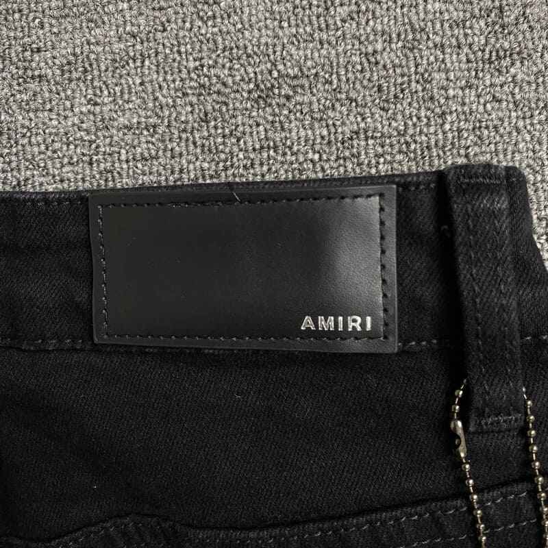 Pantalón Amiri Jeans Staggered Logo Preta