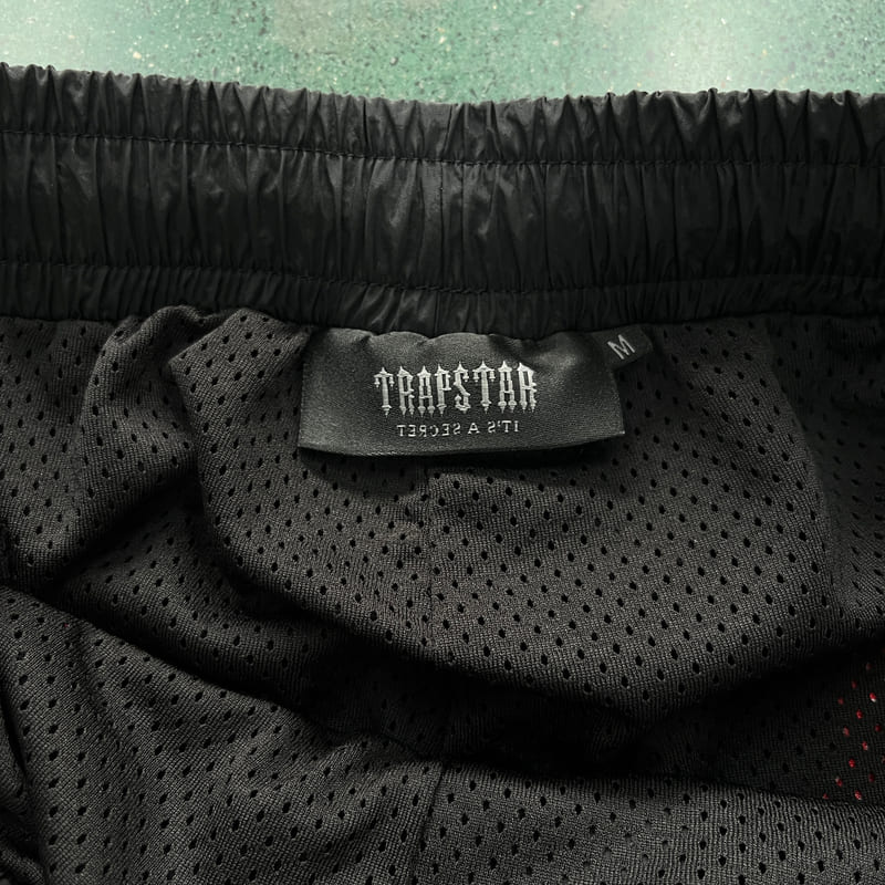 Conjuto Trapstar Irongate 2.0 Shellsuit Rojo Negro