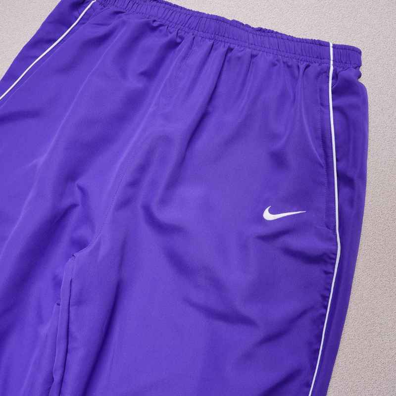 Conjunto Supreme x Nike Track Morado