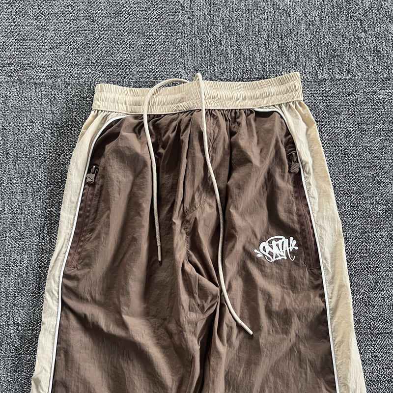 Conjunto Synaworld 'Syna Logo' Shell Café/Beige