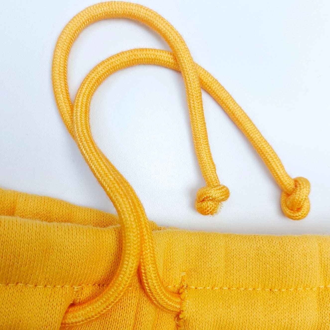 Pantalón Denim Tears Wreath x CPFM Yellow