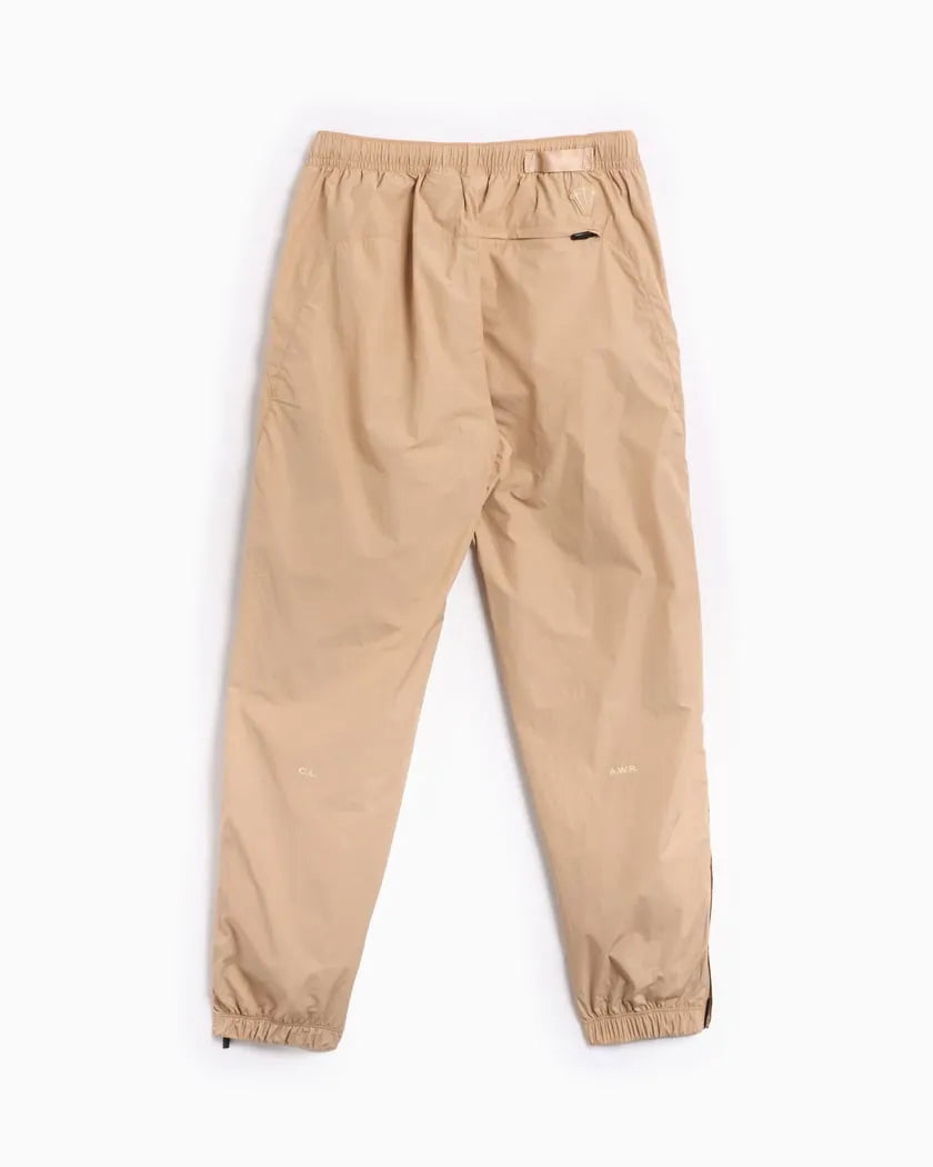 Conjunto Nike x NOCTA Woven Track Beige Areia/Café Claro