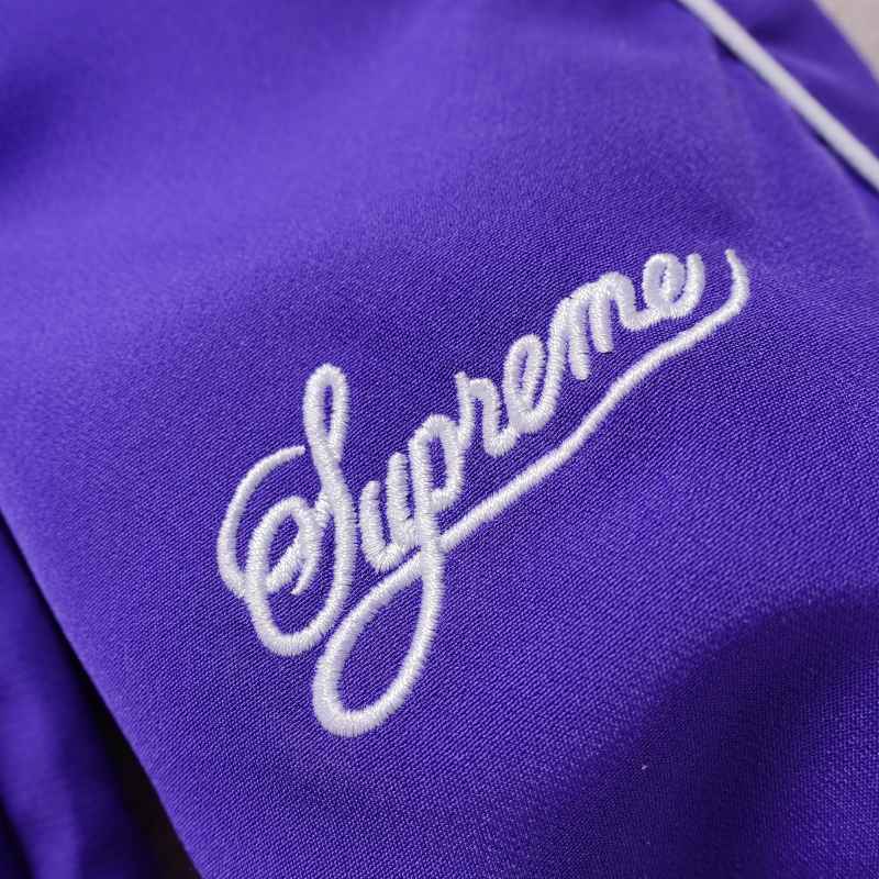 Conjunto Supreme x Nike Track Morado