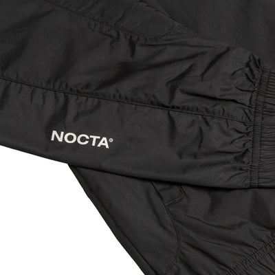 Conjunto Nike x NOCTA Woven Track Negro