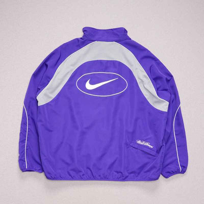 Conjunto Supreme x Nike Track Morado