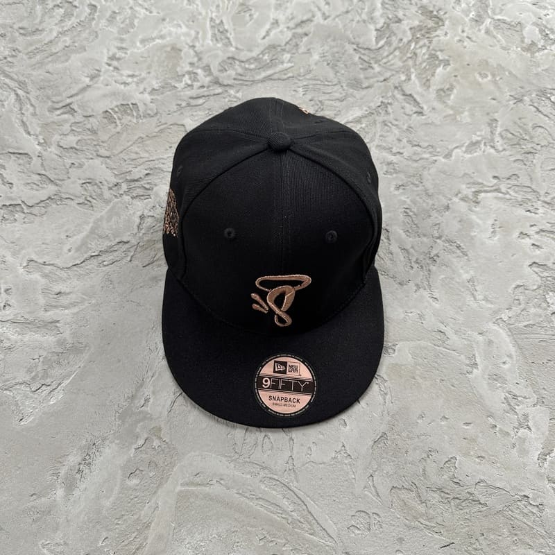 Gorra Syna World x New Era 9Fifty