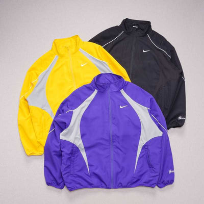 Conjunto Supreme x Nike Track Morado
