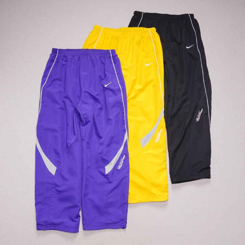 Conjunto Supreme x Nike Track Morado