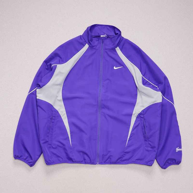 Conjunto Supreme x Nike Track Morado