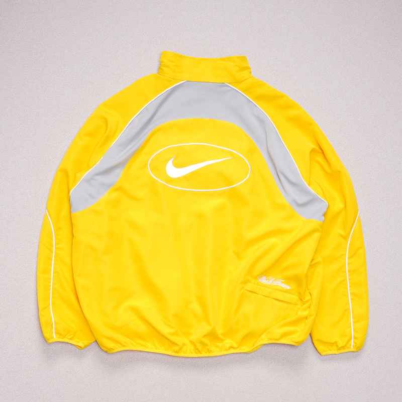 Conjunto Supreme x Nike Track Amarillo