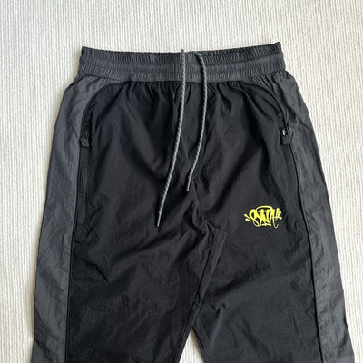 Conjunto Synaworld 'Syna Logo' Shell Negro/Gris/Amarillo