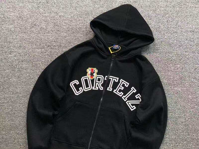 Chamarra Corteiz Arch Shield Zip Black
