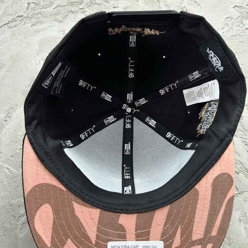 Gorra Syna World x New Era 9Fifty