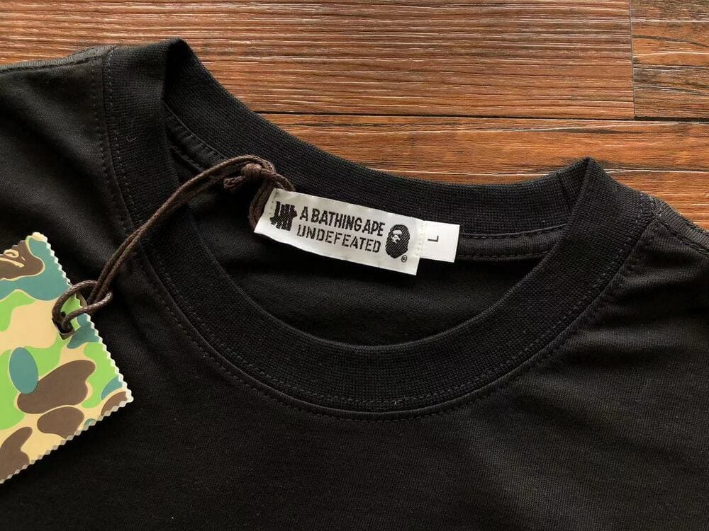 Playera BAPE x Undefeated Ape Head