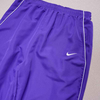 Conjunto Supreme x Nike Track Morado