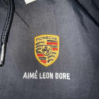 Chamarra Aimé Leon Dore x Porsche Nylon Track Black