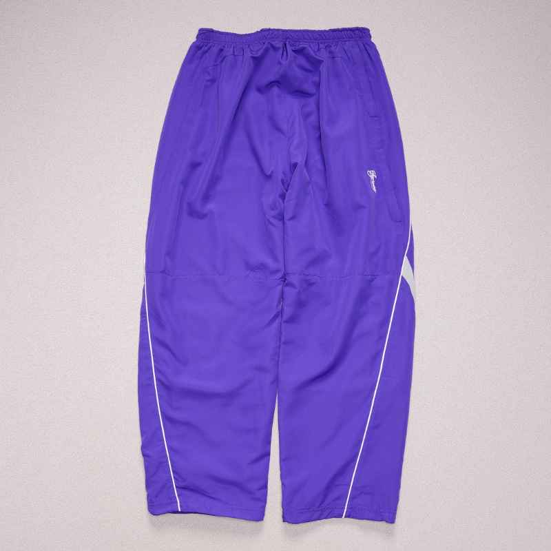 Conjunto Supreme x Nike Track Morado
