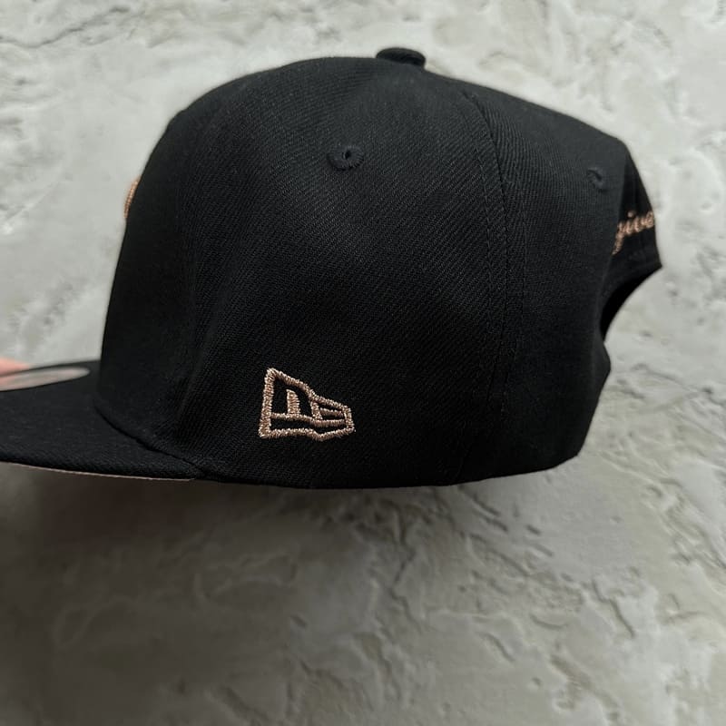 Gorra Syna World x New Era 9Fifty