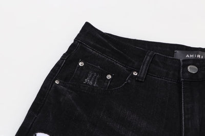 Pantalón Amiri Distressed Varsity Logo Jeans