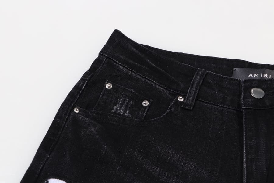 Pantalón Amiri Distressed Varsity Logo Jeans