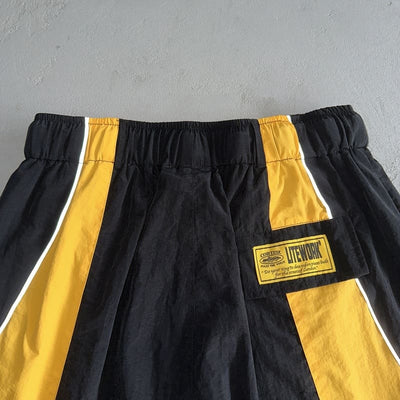 Shorts Corteiz Negro Amarillo