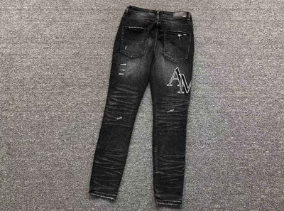 Pantalón Amiri Black Patch Jeans