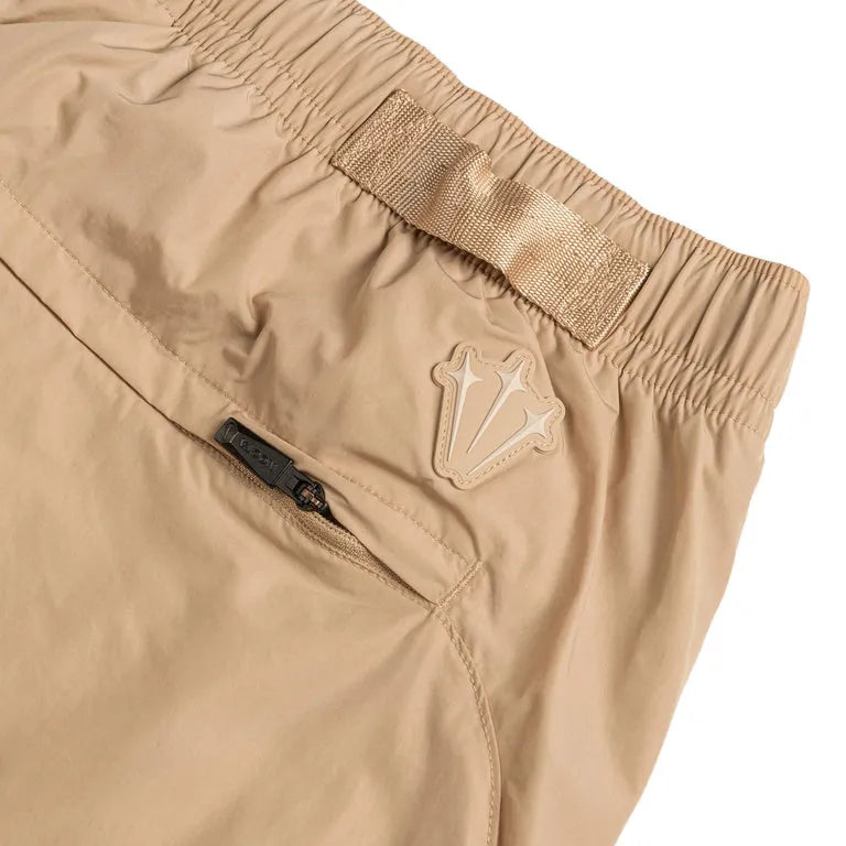 Conjunto Nike x NOCTA Woven Track Beige Areia/Café Claro
