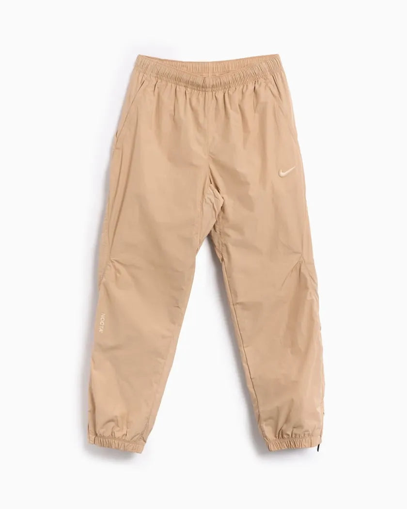 Conjunto Nike x NOCTA Woven Track Beige Areia/Café Claro