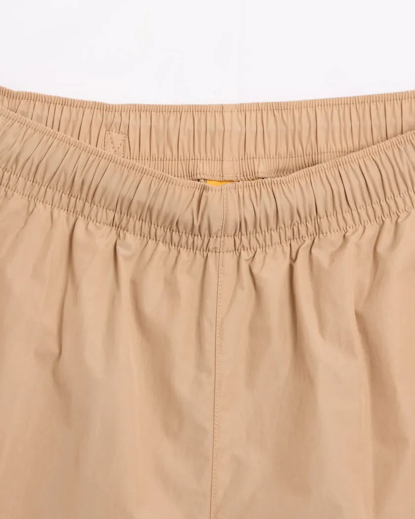 Conjunto Nike x NOCTA Woven Track Beige Areia/Café Claro