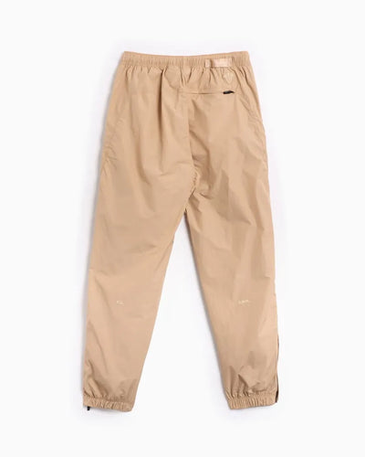 Conjunto Nike x NOCTA Woven Track Beige Areia/Café Claro