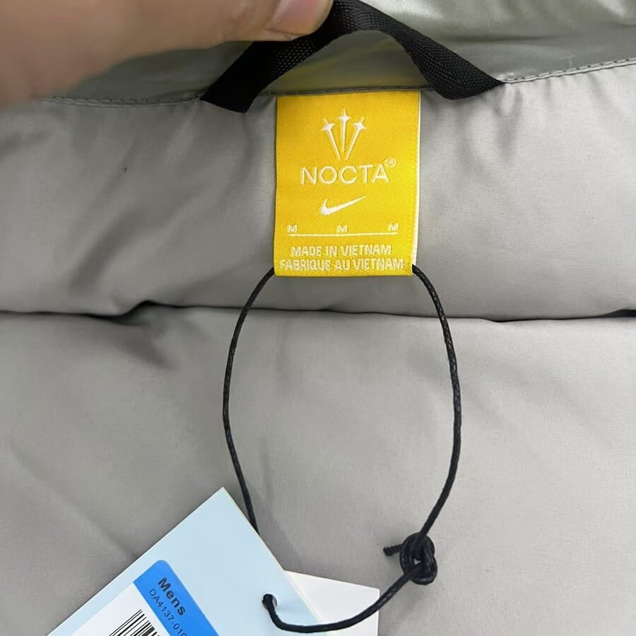 Chamarra Puffer Nike NOCTA Gris