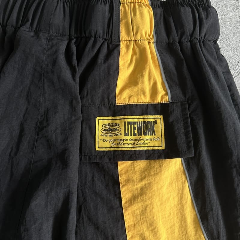 Shorts Corteiz Negro Amarillo