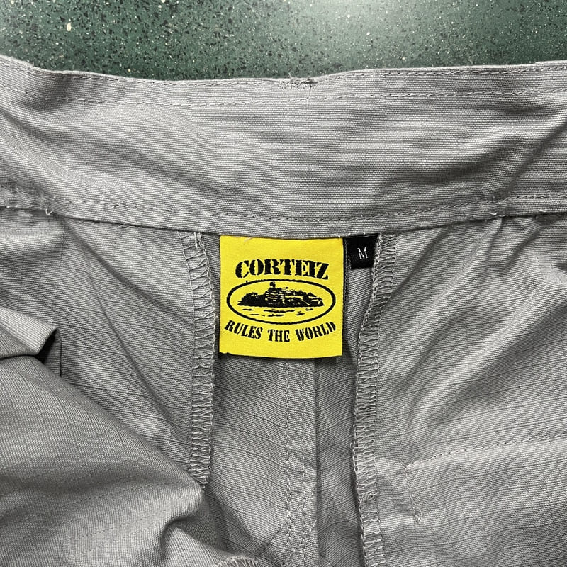 Pantalón Corteiz Cargo Gris